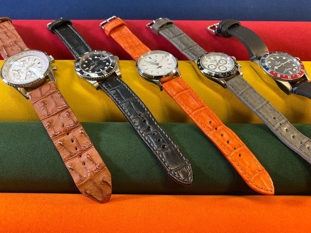 Was ist der Unterschied zwischen echtem und synthetischem Leder, und wie wirkt sich das auf die Haltbarkeit des Armbandes aus?