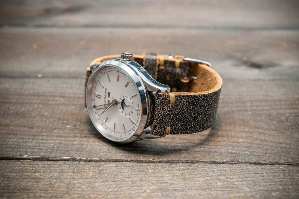 Cracked leather watch strap top